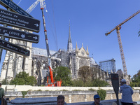 An exterior view of Notre Dame and construction cranes while the reconstruction process takes place in Paris, France, on September 15, 2024....