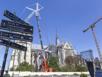 An exterior view of Notre Dame and construction cranes while the reconstruction process takes place in Paris, France, on September 15, 2024....