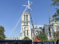 An exterior view of Notre Dame and construction cranes while the reconstruction process takes place in Paris, France, on September 15, 2024....