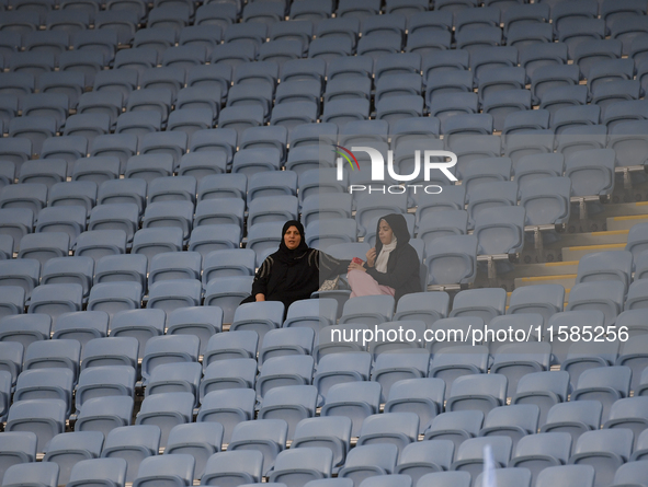 Al Wakrah SC supporters cheer for their team before the AFC Champions League Two Group A football match between Qatar's Al Wakrah SC and Ira...