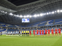 Tractor SC and Al Wakrah teams line up prior to the AFC Champions League Two Group A football match between Qatar's Al Wakrah SC and Iran's...