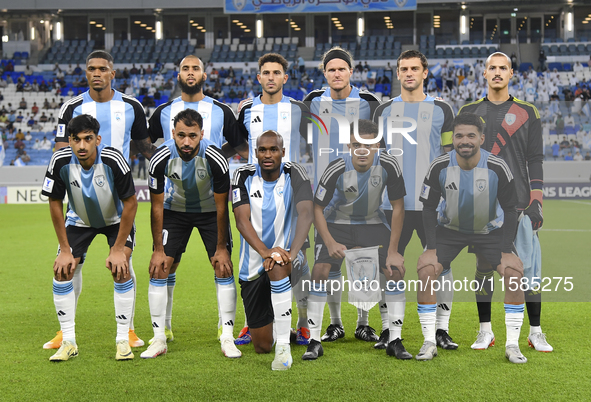 Al Wakrah SC players pose for a team photo prior to the AFC Champions League Two Group A football match between Qatar's Al Wakrah SC and Ira...