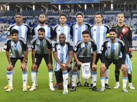 Al Wakrah SC players pose for a team photo prior to the AFC Champions League Two Group A football match between Qatar's Al Wakrah SC and Ira...