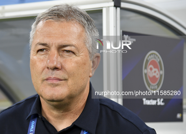 Dragan Skocic, head coach of Tractor SC, looks on prior to the AFC Champions League Group A football match between Qatar's Al Wakrah SC and...