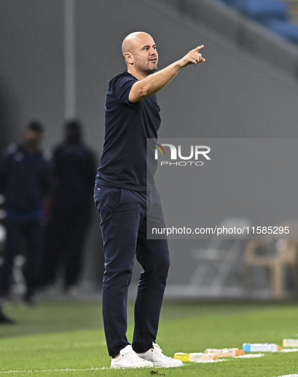 Miguel Angel Ramirez Medina, head coach of Al Wakrah SC, reacts during the AFC Champions League Group A football match between Qatar's Al Wa...