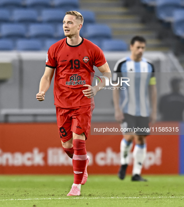 Tomislav Strkalj of Tractor SC celebrates after scoring the opening goal during the AFC Champions League elite football match between Qatar'...