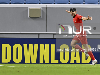 Mahdi Torabi of Tractor SC celebrates after scoring the second goal during the AFC Champions League elite football match between Qatar's Al...