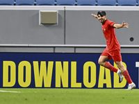 Mahdi Torabi of Tractor SC celebrates after scoring the second goal during the AFC Champions League elite football match between Qatar's Al...