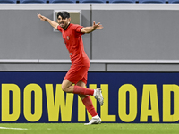 Mahdi Torabi of Tractor SC celebrates after scoring the second goal during the AFC Champions League elite football match between Qatar's Al...