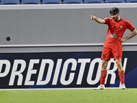 Mahdi Torabi of Tractor SC celebrates after scoring the second goal during the AFC Champions League elite football match between Qatar's Al...