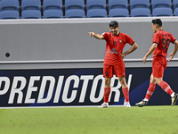 Mahdi Torabi of Tractor SC celebrates after scoring the second goal during the AFC Champions League elite football match between Qatar's Al...