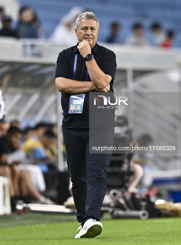 Dragan Skocic, head coach of Tractor SC, reacts during the AFC Champions League football match between Qatar's Al Wakrah SC and Iran's Tract...