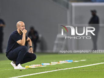 Miguel Angel Ramirez Medina, head coach of Al Wakrah SC, reacts during the AFC Champions League football match between Qatar's Al Wakrah SC...