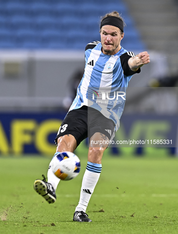 Alexander Scholz of Al Wakrah SC plays in the AFC Champions League elite football match between Qatar's Al Wakrah SC and Iran's Tractor SC a...