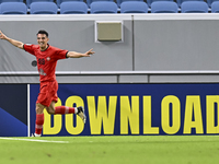 Amirhossein Hosseinzadeh of Tractor SC celebrates after scoring a goal during the AFC Champions League football match between Qatar's Al Wak...