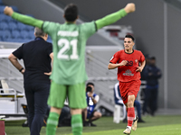 Amirhossein Hosseinzadeh of Tractor SC celebrates after scoring a goal during the AFC Champions League football match between Qatar's Al Wak...