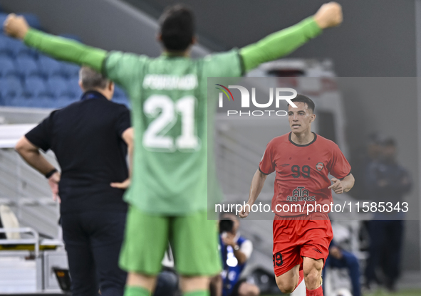 Amirhossein Hosseinzadeh of Tractor SC celebrates after scoring a goal during the AFC Champions League football match between Qatar's Al Wak...