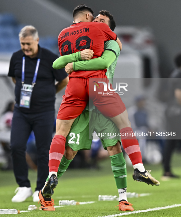 Amirhossein Hosseinzadeh of Tractor SC celebrates after scoring a goal during the AFC Champions League football match between Qatar's Al Wak...