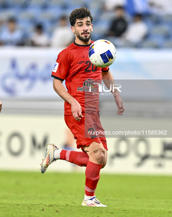 Mahdi Hashemnezhad of Tractor SC plays in the AFC Champions League elite football match between Qatar's Al Wakrah SC and Iran's Tractor SC a...