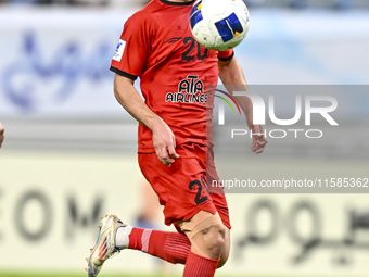 Mahdi Hashemnezhad of Tractor SC plays in the AFC Champions League elite football match between Qatar's Al Wakrah SC and Iran's Tractor SC a...