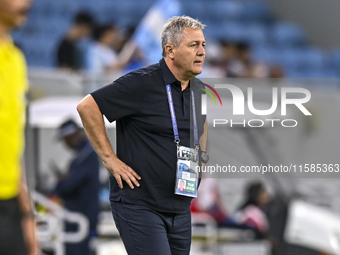 Dragan Skocic, head coach of Tractor SC, reacts during the AFC Champions League football match between Qatar's Al Wakrah SC and Iran's Tract...