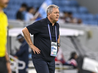 Dragan Skocic, head coach of Tractor SC, reacts during the AFC Champions League football match between Qatar's Al Wakrah SC and Iran's Tract...