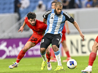 Aissa Belal Laidouni of Al Wakrah SC battles for the ball with Mahdi Hashemnezhad of Tractor SC during the AFC Champions League football mat...