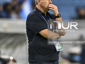 Dragan Skocic, head coach of Tractor SC, reacts during the AFC Champions League elite football match between Qatar's Al Wakrah SC and Iran's...