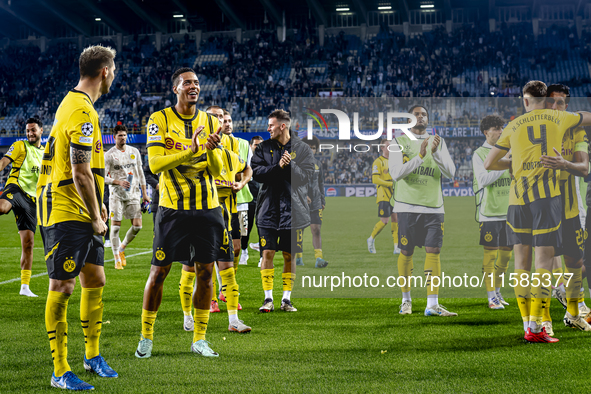 Players of Borussia Dortmund celebrate the victory after the game during the match Club Brugge - Borussia Dortmund at the Jan Breydelstadion...