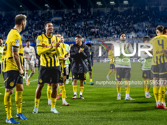 Players of Borussia Dortmund celebrate the victory after the game during the match Club Brugge - Borussia Dortmund at the Jan Breydelstadion...