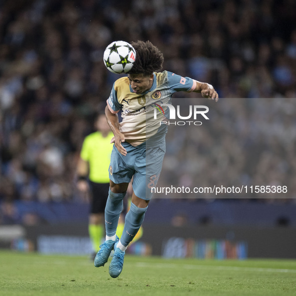 Rico Lewis #82 of Manchester City F.C. during the UEFA Champions League League Stage match between Manchester City and Football Club Interna...