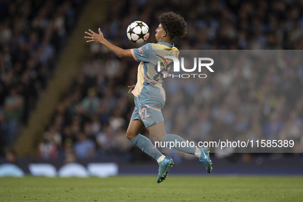 Rico Lewis #82 of Manchester City F.C. during the UEFA Champions League League Stage match between Manchester City and Football Club Interna...