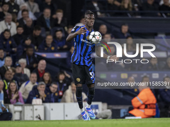 Yann Aurel Bisseck #31 of Inter Milan during the UEFA Champions League League Stage match between Manchester City and Football Club Internaz...