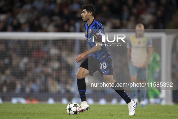 Mehdi Taremi #99 of Inter Milan during the UEFA Champions League League Stage match between Manchester City and Football Club Internazionale...