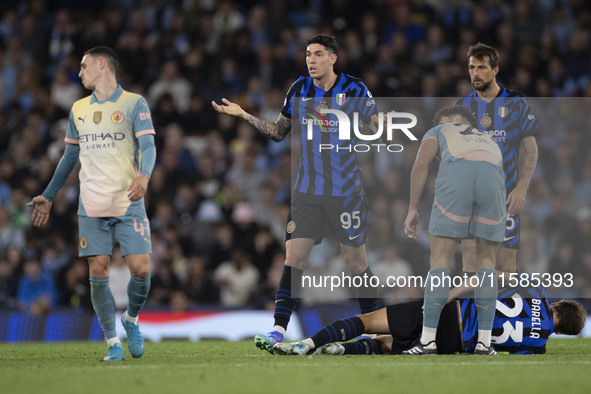 Alessandro Bastoni #95 of Inter Milan gesticulates during the UEFA Champions League League Stage match between Manchester City and Football...