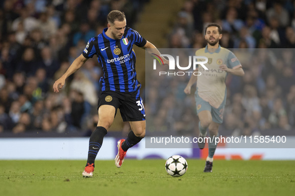 Carlos Augusto #30 of Inter Milan during the UEFA Champions League group stage match between Manchester City and Football Club Internazional...