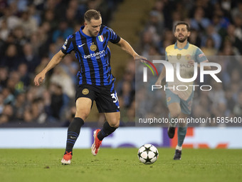 Carlos Augusto #30 of Inter Milan during the UEFA Champions League group stage match between Manchester City and Football Club Internazional...