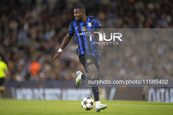 Marcus Thuram #9 of Inter Milan during the UEFA Champions League League Stage match between Manchester City and Football Club Internazionale...