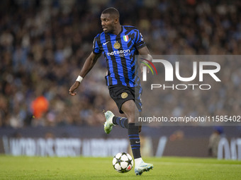 Marcus Thuram #9 of Inter Milan during the UEFA Champions League League Stage match between Manchester City and Football Club Internazionale...