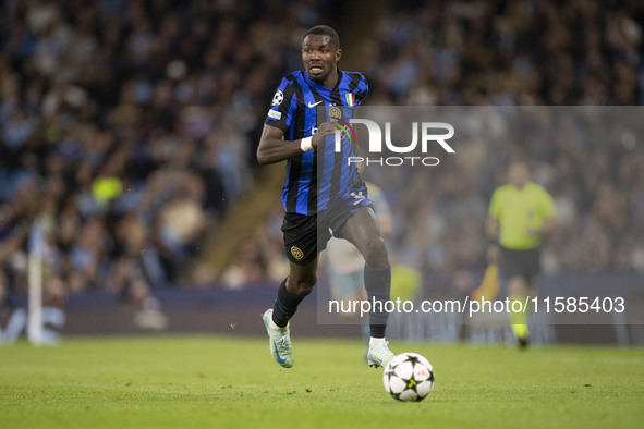 Marcus Thuram #9 of Inter Milan during the UEFA Champions League League Stage match between Manchester City and Football Club Internazionale...