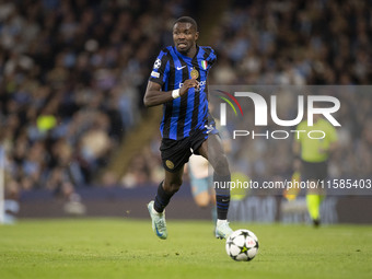 Marcus Thuram #9 of Inter Milan during the UEFA Champions League League Stage match between Manchester City and Football Club Internazionale...