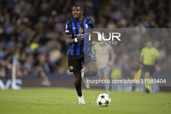 Marcus Thuram #9 of Inter Milan during the UEFA Champions League League Stage match between Manchester City and Football Club Internazionale...