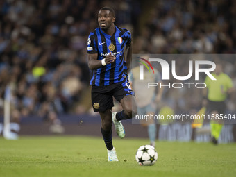 Marcus Thuram #9 of Inter Milan during the UEFA Champions League League Stage match between Manchester City and Football Club Internazionale...