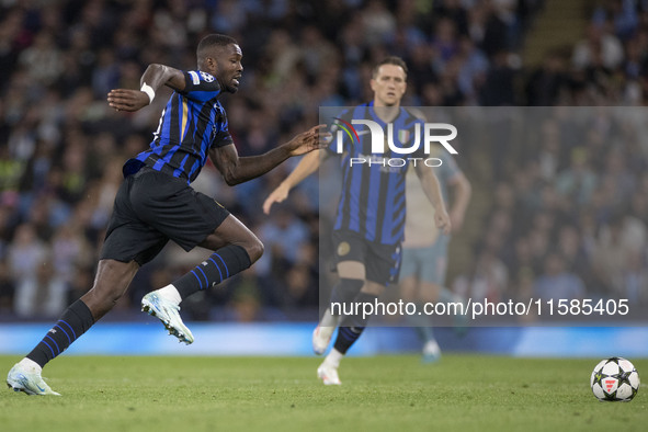 Marcus Thuram #9 of Inter Milan during the UEFA Champions League League Stage match between Manchester City and Football Club Internazionale...