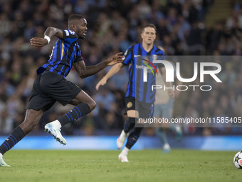 Marcus Thuram #9 of Inter Milan during the UEFA Champions League League Stage match between Manchester City and Football Club Internazionale...