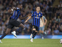 Marcus Thuram #9 of Inter Milan during the UEFA Champions League League Stage match between Manchester City and Football Club Internazionale...