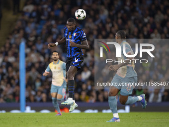 Marcus Thuram #9 of Inter Milan during the UEFA Champions League League Stage match between Manchester City and Football Club Internazionale...