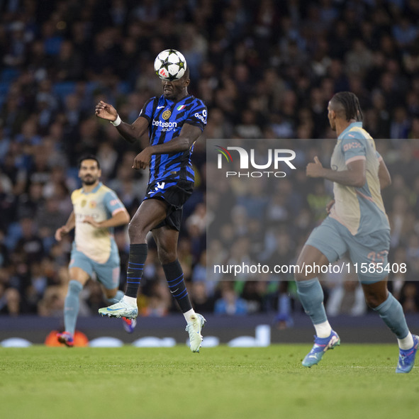 Marcus Thuram #9 of Inter Milan during the UEFA Champions League League Stage match between Manchester City and Football Club Internazionale...