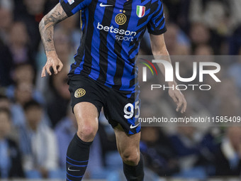 Alessandro Bastoni #95 of Inter Milan during the UEFA Champions League Group Stage match between Manchester City and Football Club Internazi...