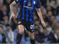 Alessandro Bastoni #95 of Inter Milan during the UEFA Champions League Group Stage match between Manchester City and Football Club Internazi...